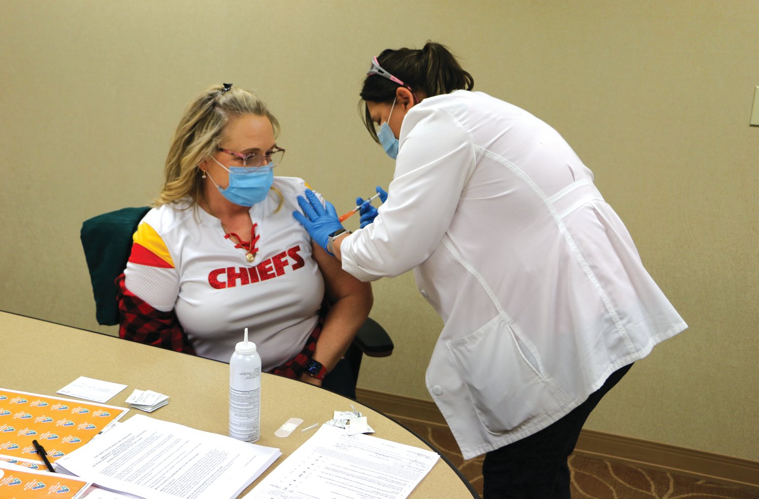 Jenny Force, Director of Neurology and Respiratory Therapy at Bothwell Regional Health Center, gets one of the first COVID-19 vaccines Friday, Dec. 18.