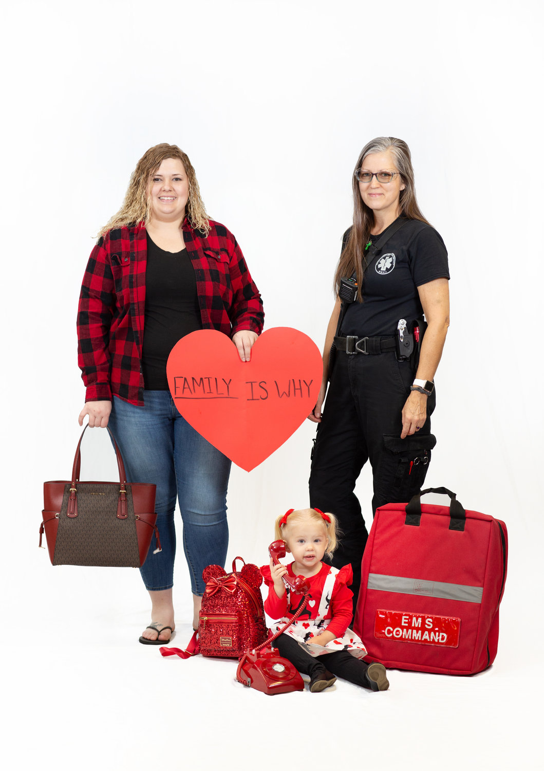 From left, Tina Plain, Pettis County Ambulance District (PCAD) EMT-B, and her daughter, Ava Plain, and Charisse Bauer, PCAD EMT, showcase purses available for purchase at the 2021 Wear Red for Women auction along with an automated external defibrillator (AED). Proceeds from this year’s event will be used to purchase additional AEDs for public places in the community. To reserve tickets, visit www.brhc.org/2021wearred.