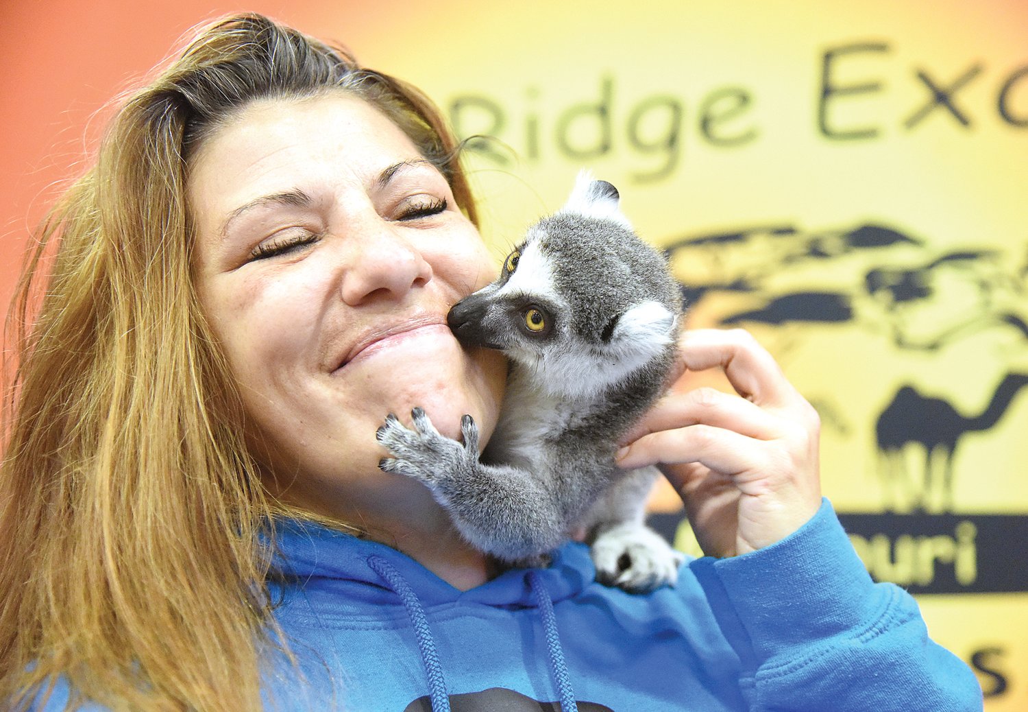 During the Home and Garden Show Saturday, Jen Colantino, of Sedalia, gets a kiss from a lemur at vendor Thorni Ridge Exotics’ booth. “Oh, he’s so sweet,” Colantino said of the affectionate primate.