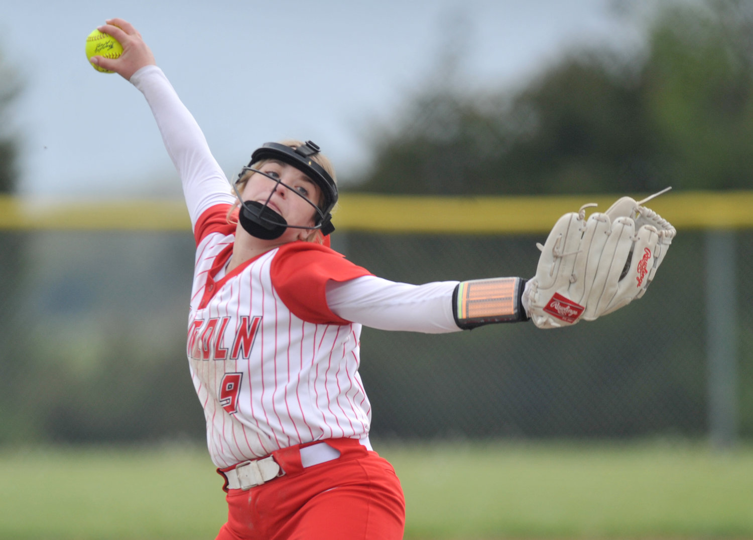 Lady Cardinals senior Cadyn Paxton delivers a pitch April 17 during the Kaysinger Conference Softball Tournament in Lincoln.