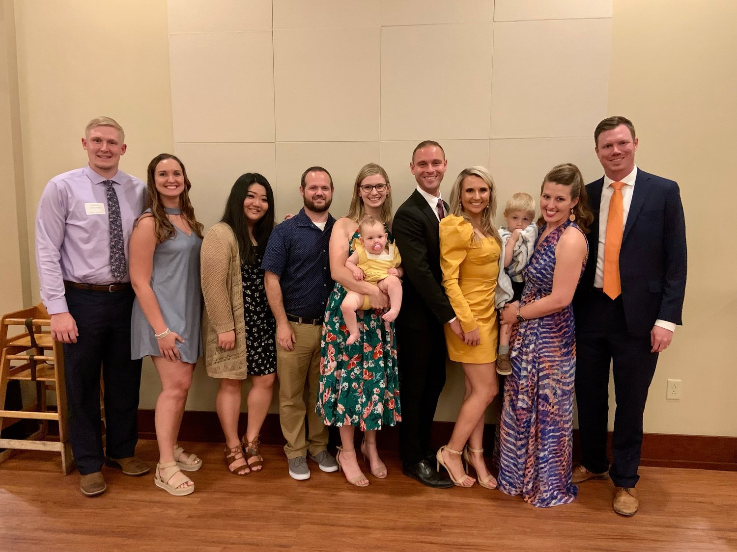 Several new physicians have joined or will join the Bothwell Regional Health Center medical team, with the new Bothwell-University of Missouri Rural Family Medicine Residency being a leading reason for them to choose Bothwell. Shown here with their spouses and family following their recent residency graduation program are from left, Dr. Dalton Lohsandt (projected to arrive in 2022 or 2023) and Kelly Lohsandt; Ellie Euer, residency program coordinator; Eddie Emery and Dr. Alyssa Emery (holding Lucy Emery); Greg Djinis and Dr. Lisa Wadowski; and Dr. Misty Todd (holding Gabe Emery) and Dr. Matthew Roehrs.
