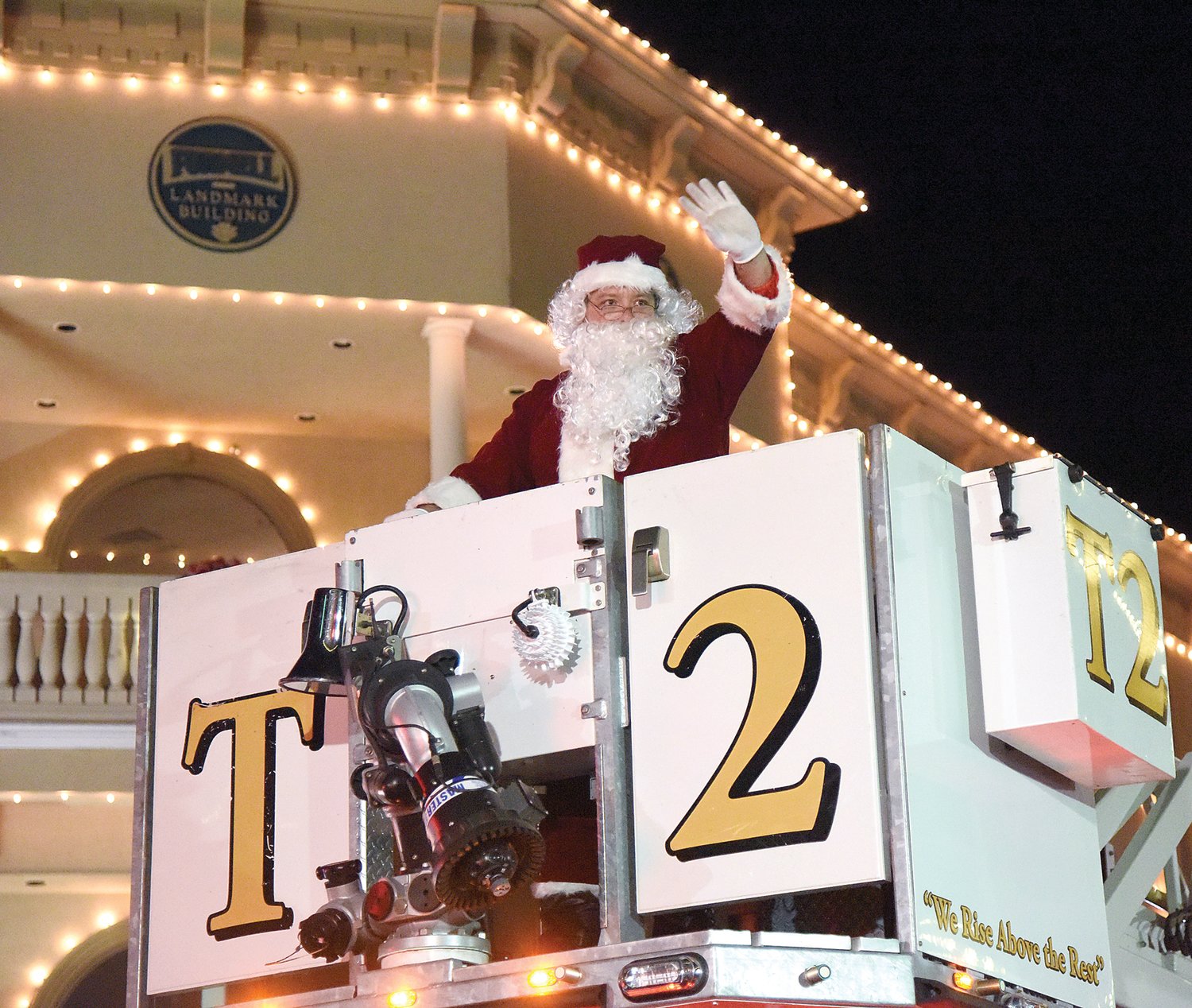 Santa waves Saturday night atop the Sedalia Fire Department truck during the Sedalia Area Chamber of Commerce 2021Christmas Parade. Thousands turned out for the annual parade lining the streets downtown. The theme this year was “Christmas at the Movies.”