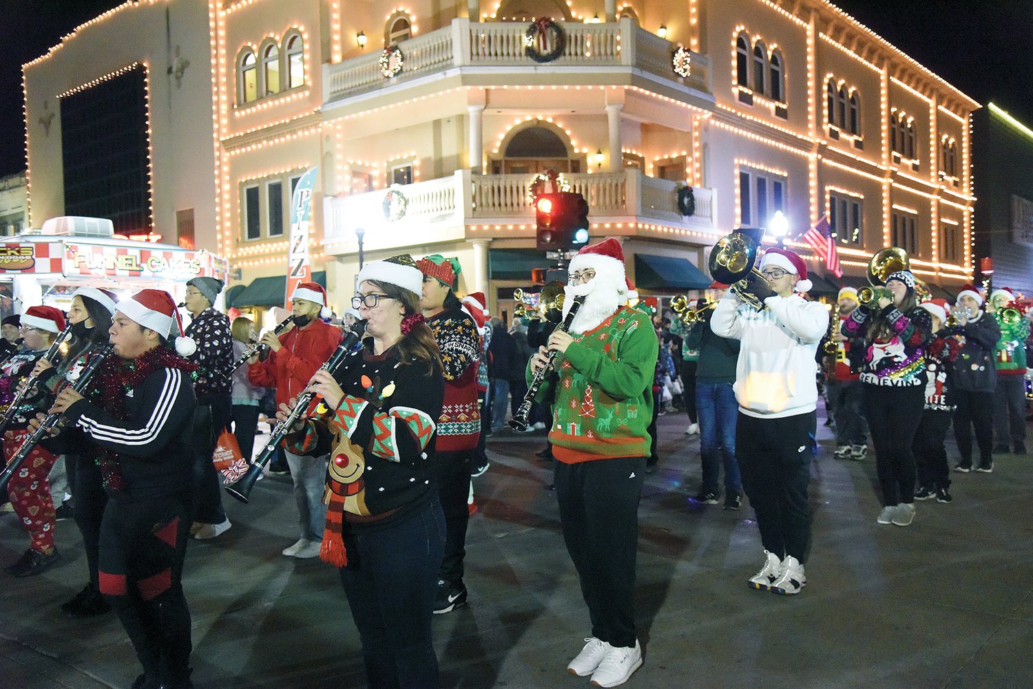 Smith-Cotton High School Marching Tigers dressed up in Christmas attire for the annual Christmas Parade Saturday evening in downtown Sedalia. In the Band category, Green Ridge Marching Tigers took first place and Smithton Marching Tiger received an Honorable Mention.