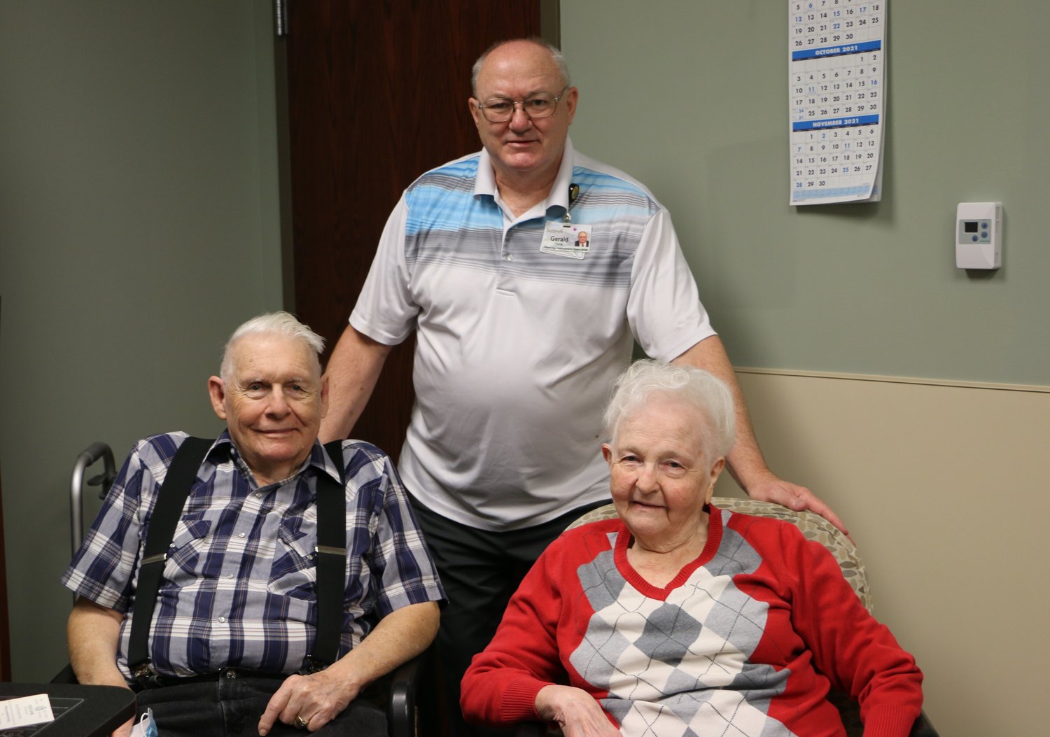 Front row, from left, Clyde and Beatrice Jobson. Back row, Gerald Young, Bothwell ENT board-certified hearing instrument specialist.