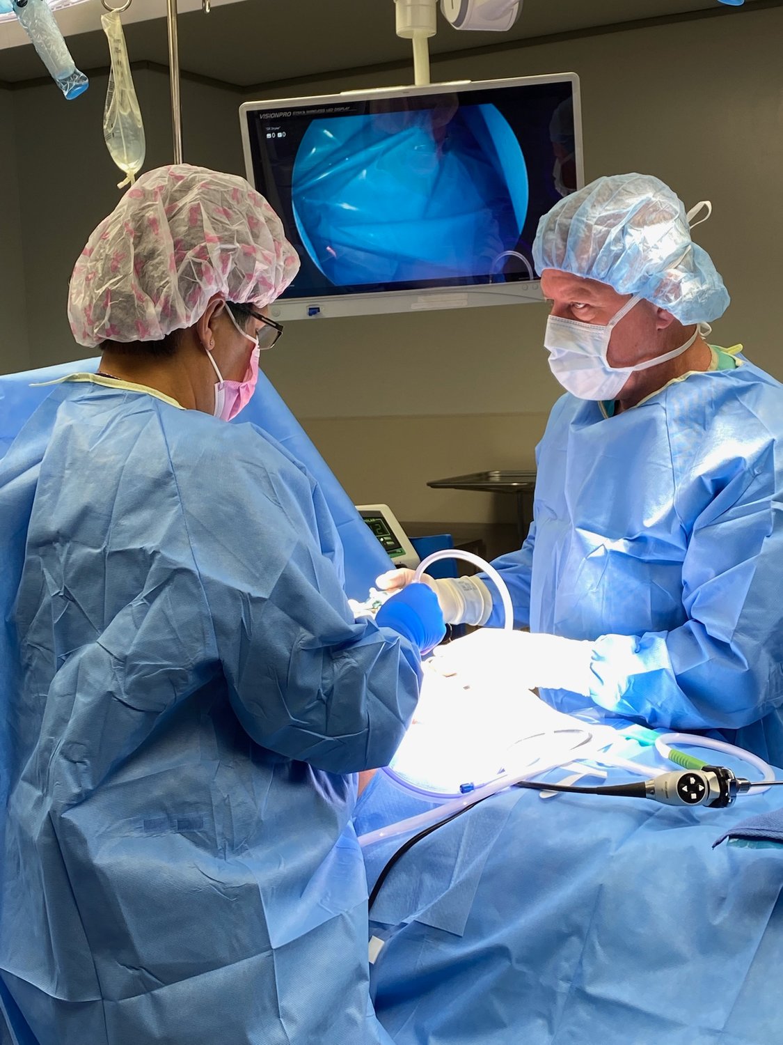Dr. Stuart Braverman, right, performs surgery recently at Bothwell Regional Health Center with Cheri Gorrell, scrub nurse. Medical students are often able to assume the role of “first assistant” working across from surgeons, where they learn by helping select equipment, hold open incisions, stop bleeding or close incisions.