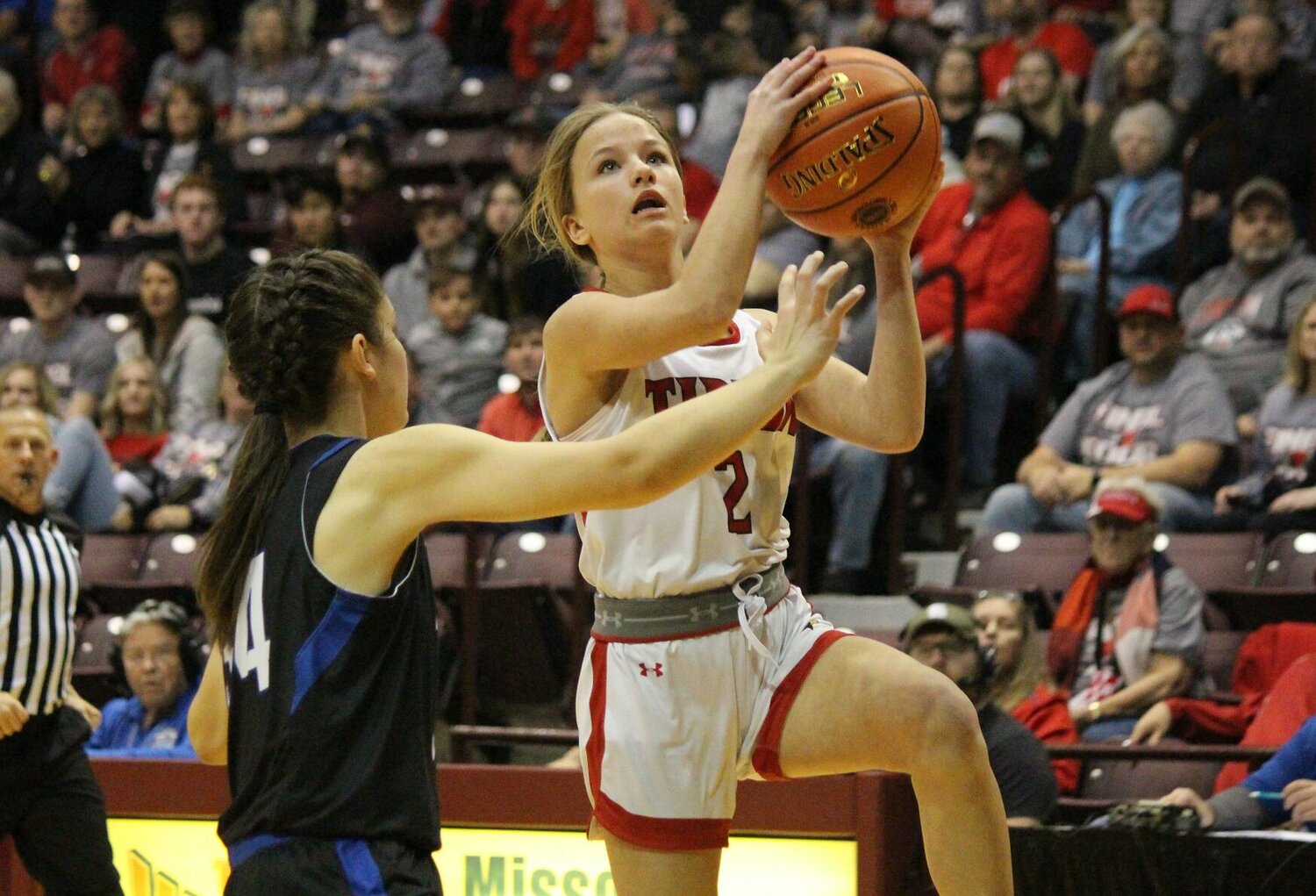 Lady Cardinals freshman Kya Smith attempts a layup in the second half against Norwood in Friday's Final Four contest.