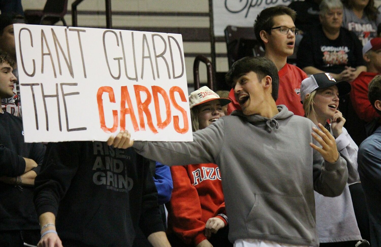 A Tipton fan holds up a sign in the second half of Friday night's game against the Lady Pirates.